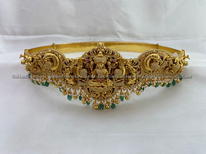 925 Silver Nakshi Temple Waist Belt Vaddanam with intricate temple motifs, perfect for bridal wear and festive celebrations.