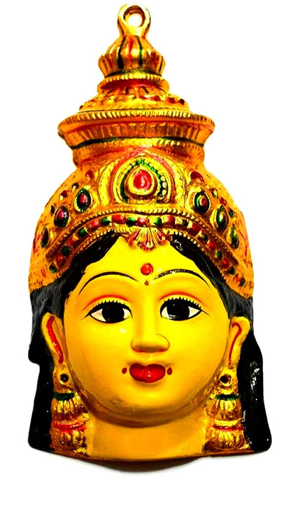 Goddess Varalakshmi's radiant face adorned with lotus flowers, representing purity and abundance, during the auspicious Varalakshmi Vratham festival - Golden Collections